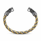 Wikinger Armring aus Edelstahl in Gold und Silber mit Wolfsköpfen auf weissem Hintergrund