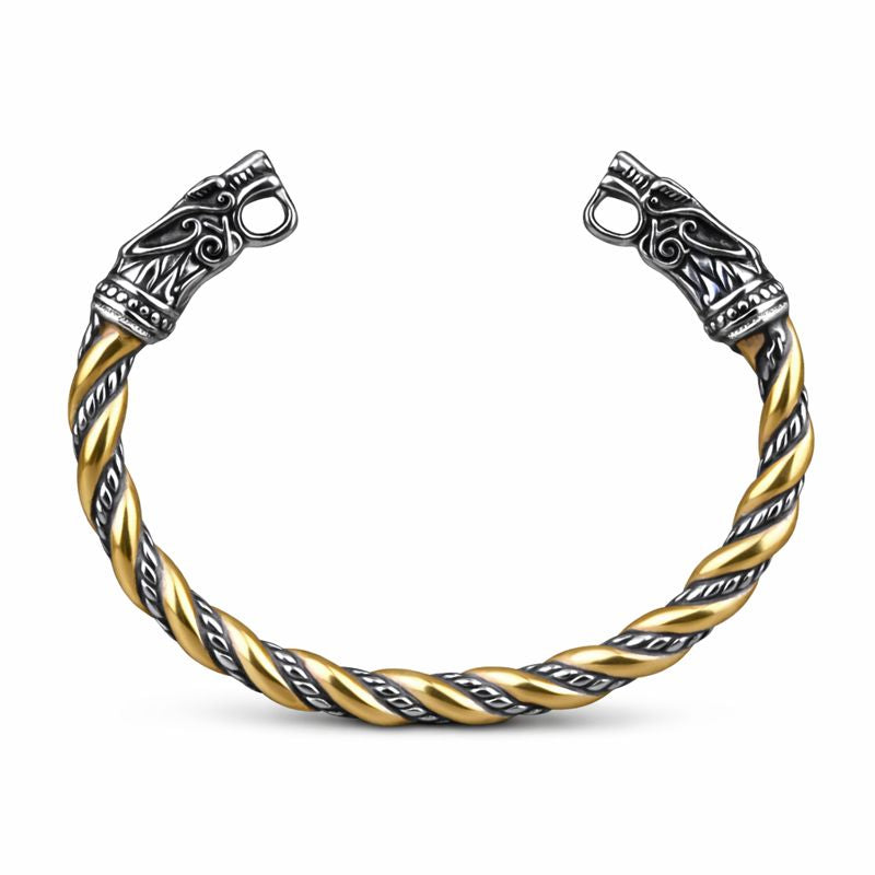 Wikinger Armring aus Edelstahl in Gold und Silber mit Wolfsköpfen auf weissem Hintergrund